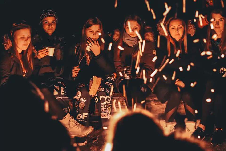 Group of friends around a bonfire