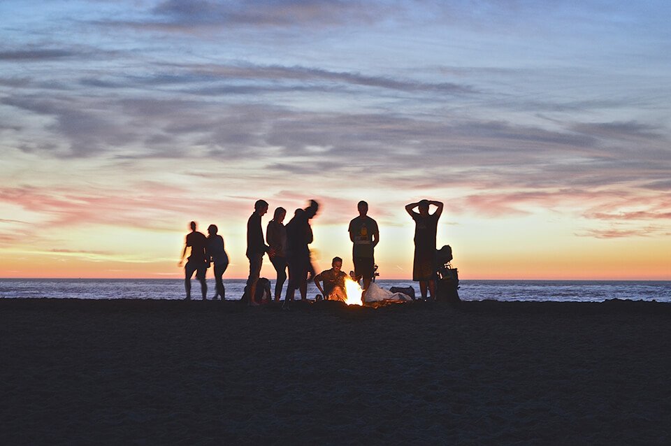 Group of friends around a bonfire
