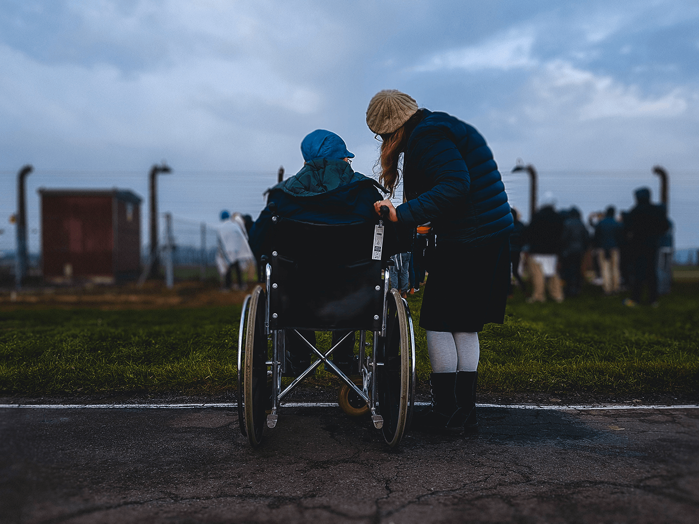 Woman caring for a disabled woman in a wheelchair