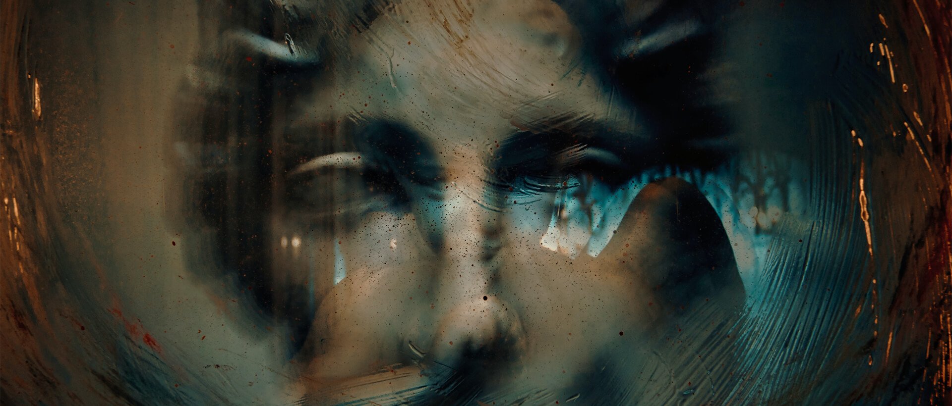 a blurry image of a woman's face and hands.