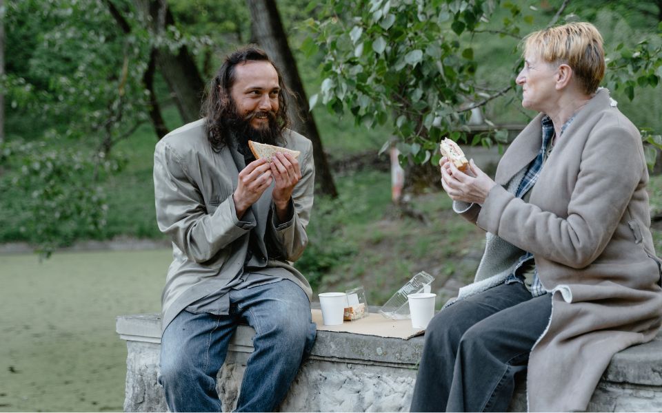 pay it forward by buying a homeless person a meal