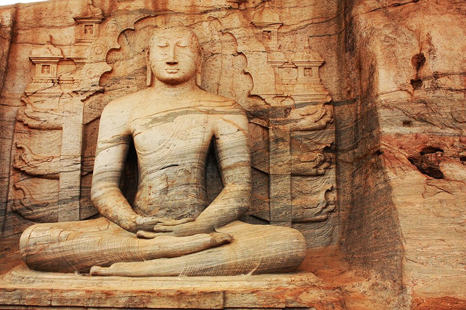 Carving of Buddha in rock