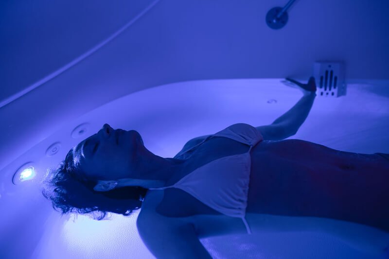Relaxing in a sensory deprivation tank